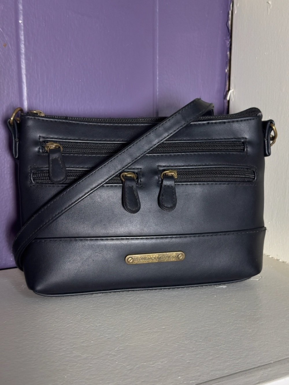 Stone Mountain bonded leather crossbody bag Women’s purses